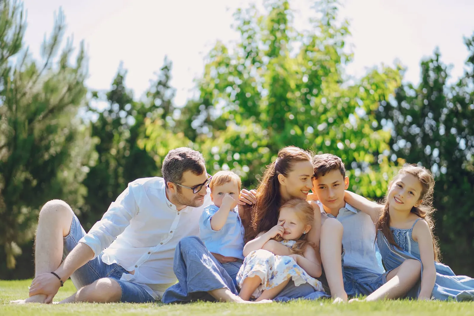 Happy family protected by Samantha Lewis Agency insurance in Livonia, MI
